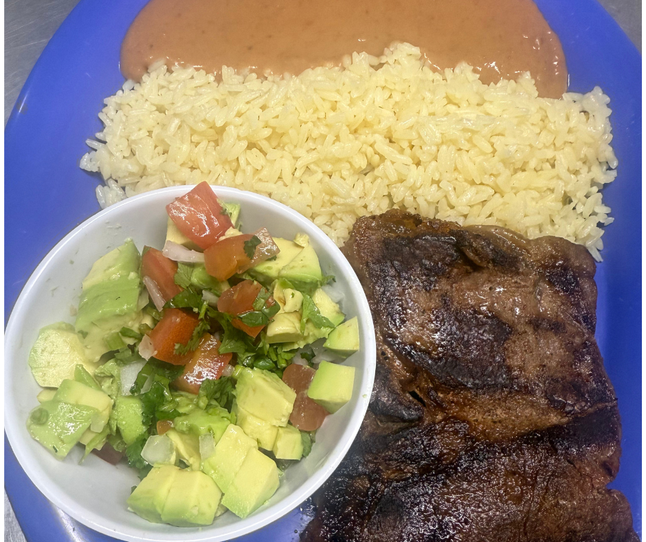 Carne asada with rice, beans and chirimol.