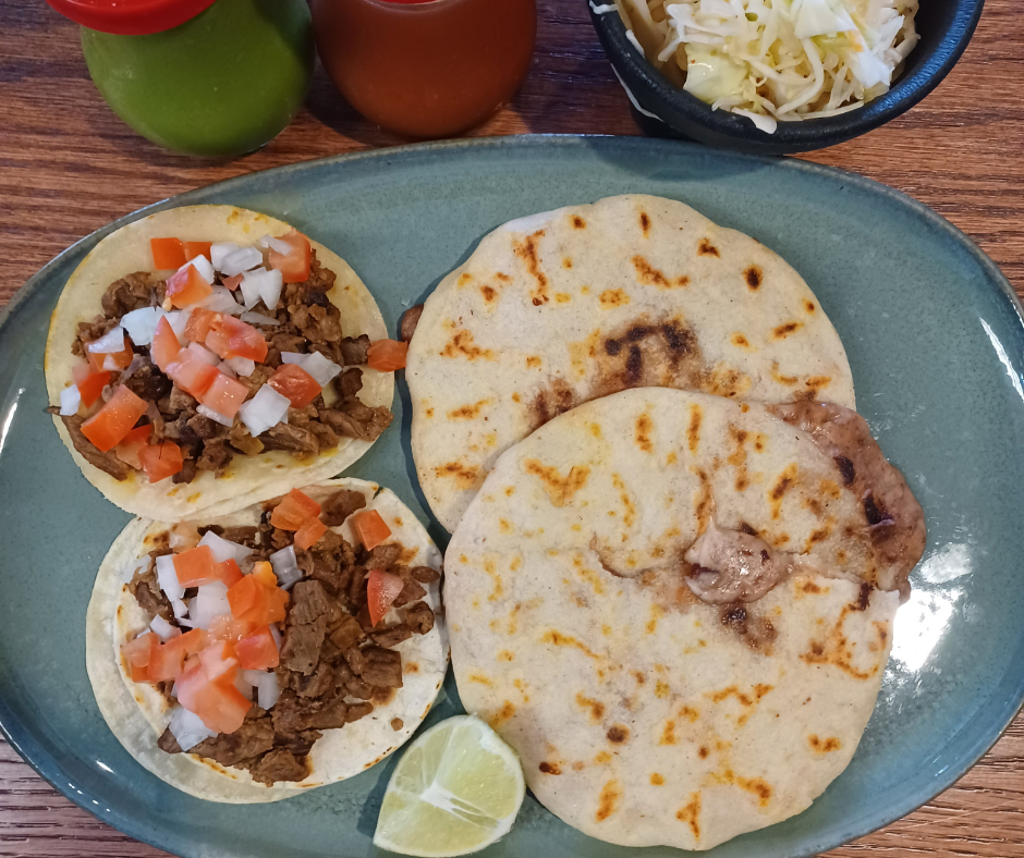 Two pupusas and two tacos.